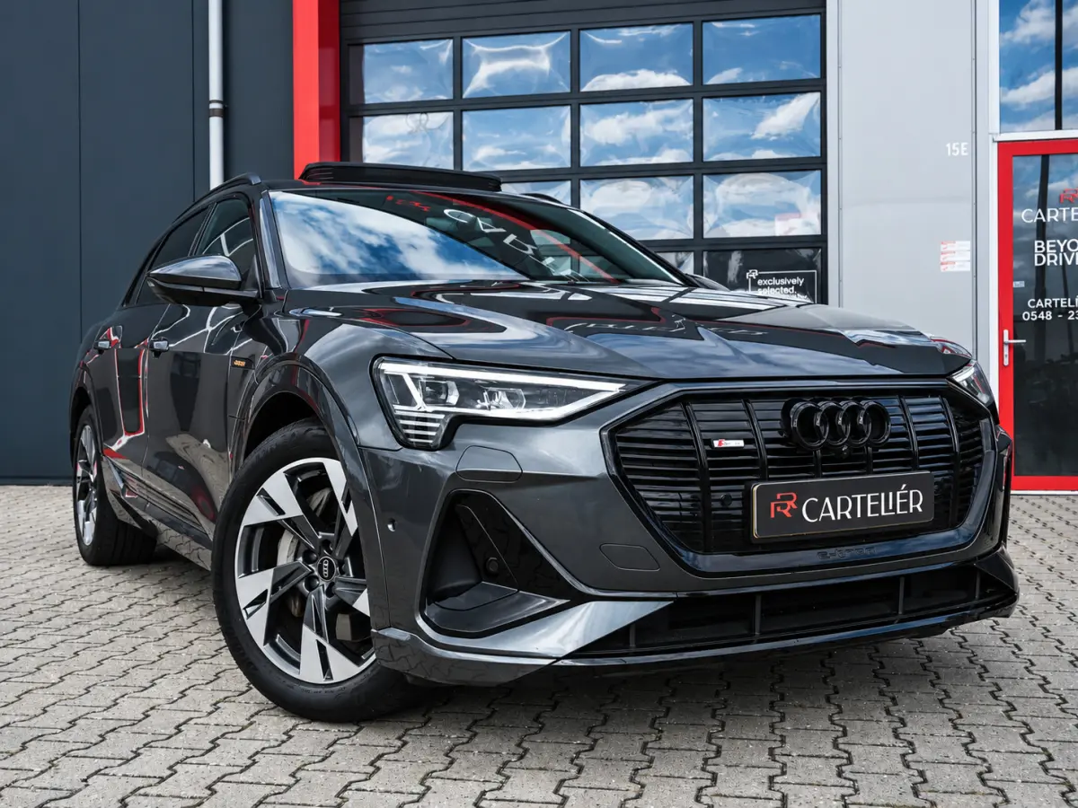 55 Quattro S-Line 95 kWh | Full Option | Origineel NL | Pano | Luchtvering | B&O | Memory | 360 | Adaptive | Carplay | Digital Dash | Alcantara | Matrix Led | Keyless | Ambient | F1 Flippers