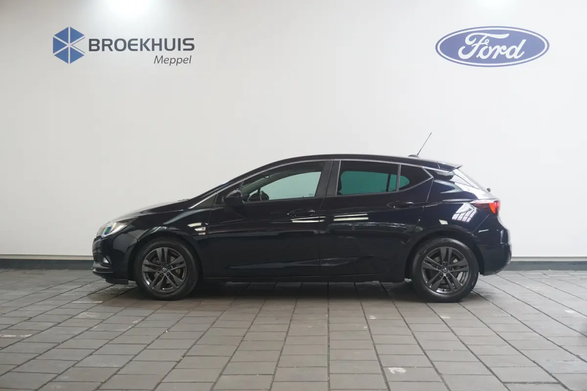 1.4 Turbo 120 Jaar Edition | Volledige Historie | Trekhaak Afneembaar | AGR-Stoelen | Climate Control | Navigatie | 1450kg Trekgewicht |