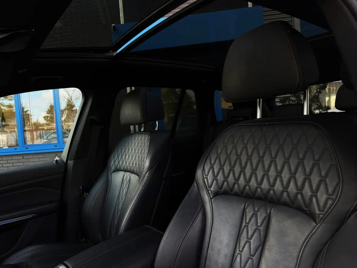 XDrive45e High Executive 361PK|NL Auto|Laser Light|ProfNavi|M-Pakket|Luchtvering|PANO|Adaptive|50e Editie|HUD|360C|Harman/K