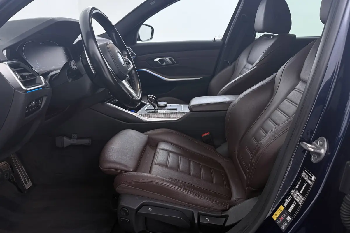 320e Business Edition Plus M-Sport | Trekhaak | Adap. Cruise | Org NL | Sportstoelen | Leer | 3-Zone Clima |