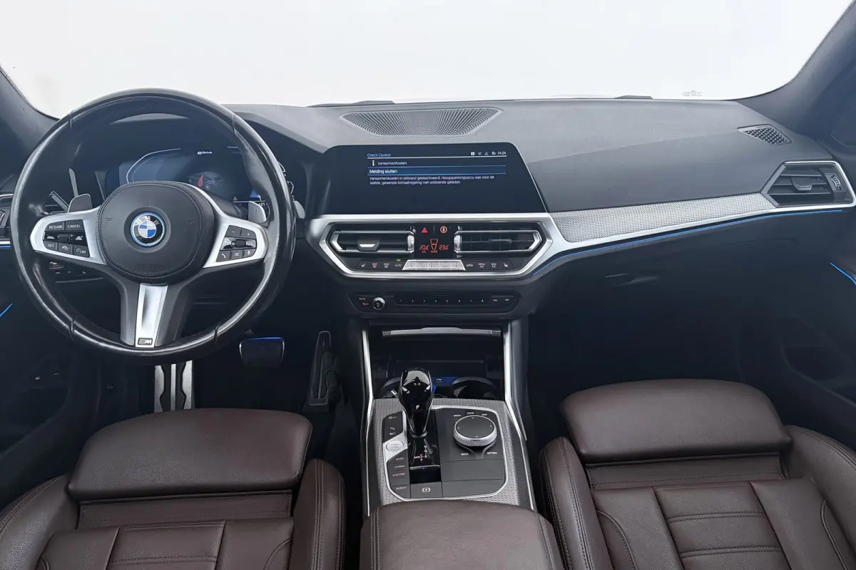 320e Business Edition Plus M-Sport | Trekhaak | Adap. Cruise | Org NL | Sportstoelen | Leer | 3-Zone Clima |
