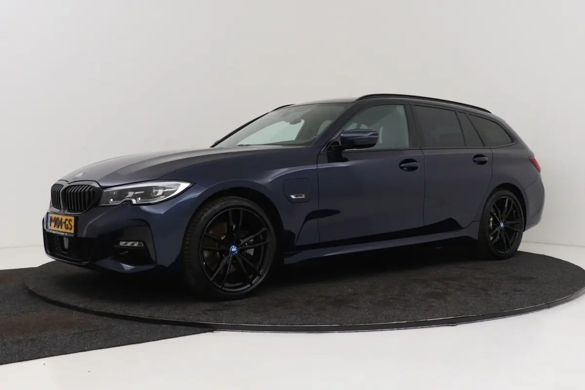 320e Business Edition Plus M-Sport | Trekhaak | Adap. Cruise | Org NL | Sportstoelen | Leer | 3-Zone Clima |
