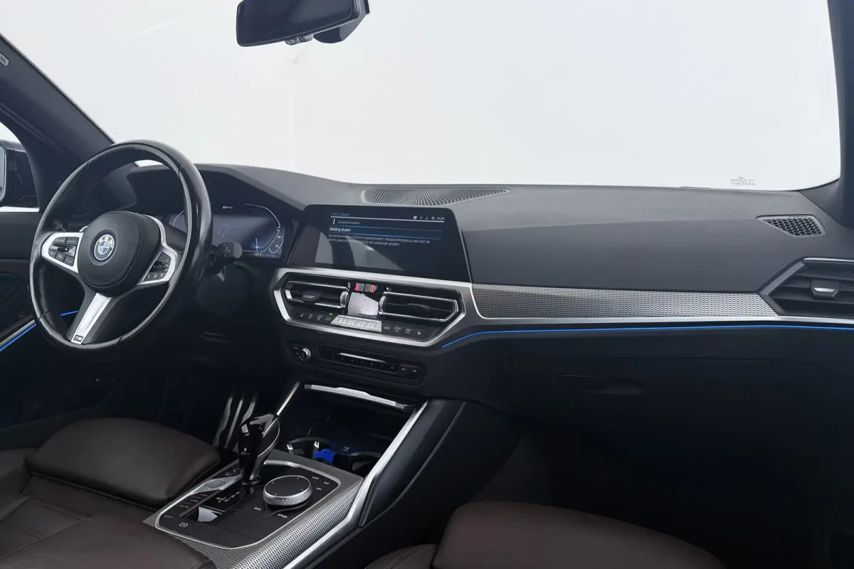 320e Business Edition Plus M-Sport | Trekhaak | Adap. Cruise | Org NL | Sportstoelen | Leer | 3-Zone Clima |