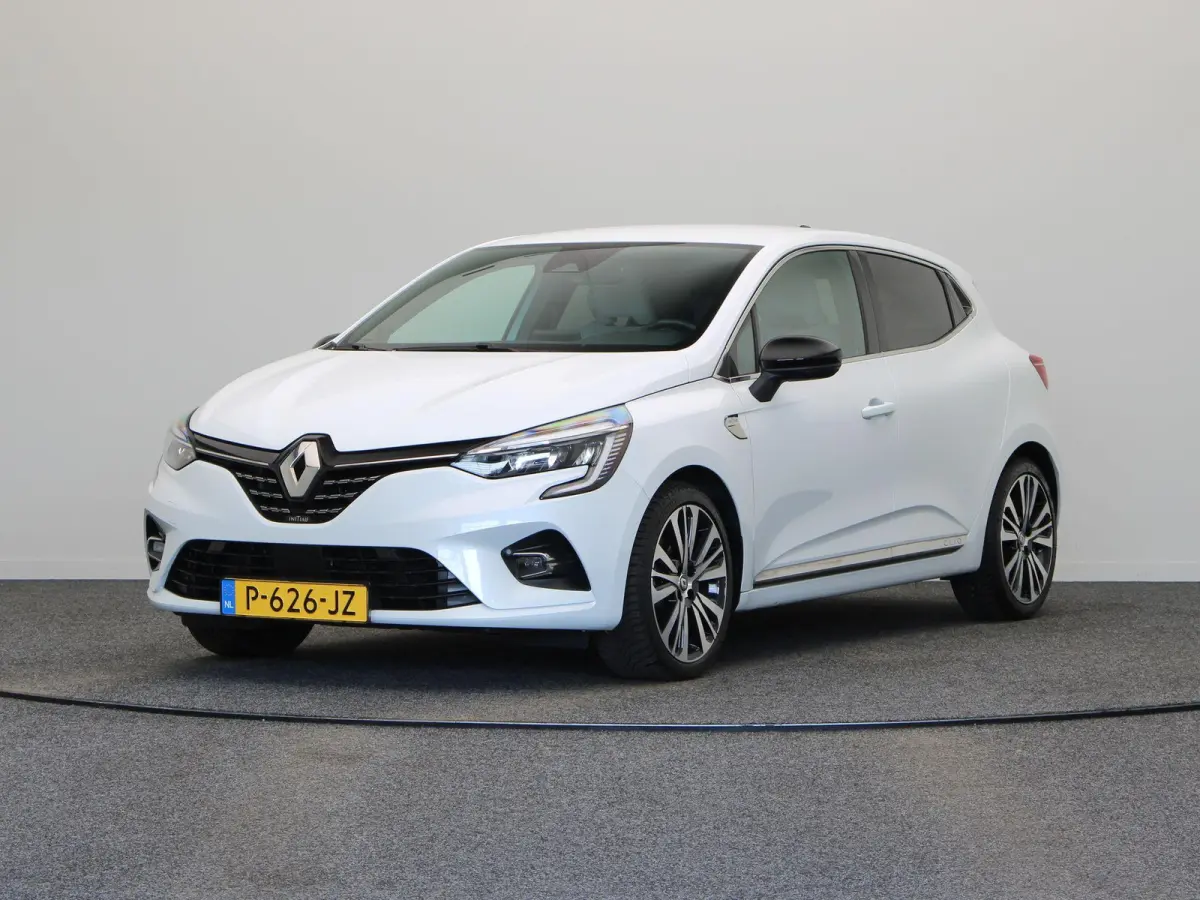 E-Tech Hybrid 140pk Initiale Paris | Stoel- en stuurwielverwarming | Lederen bekleding | Achteruitrijcamera | Apple Carplay / Android Auto |