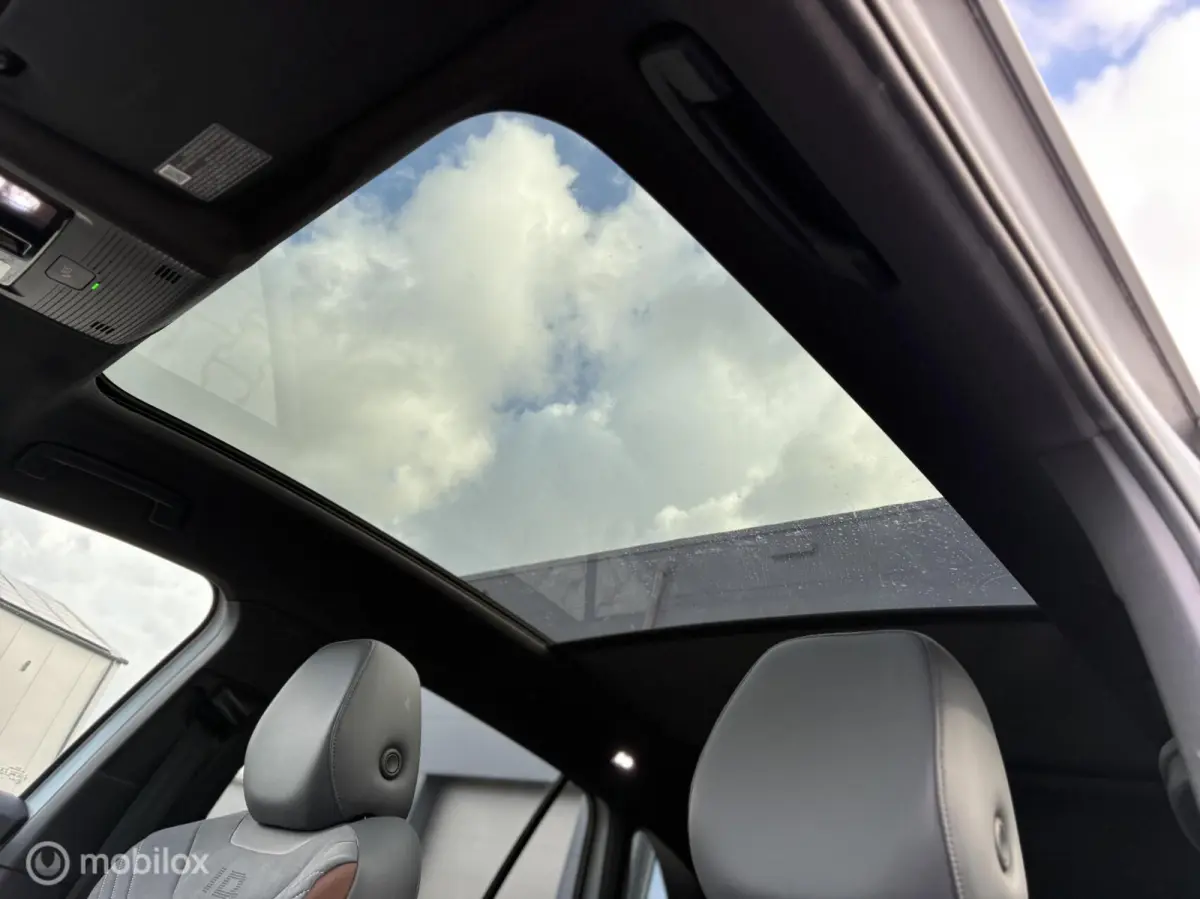 77 kWh | SOH 90% MOBA | Warmtepomp | 360 camera | Panorama | Massage | HUD AR