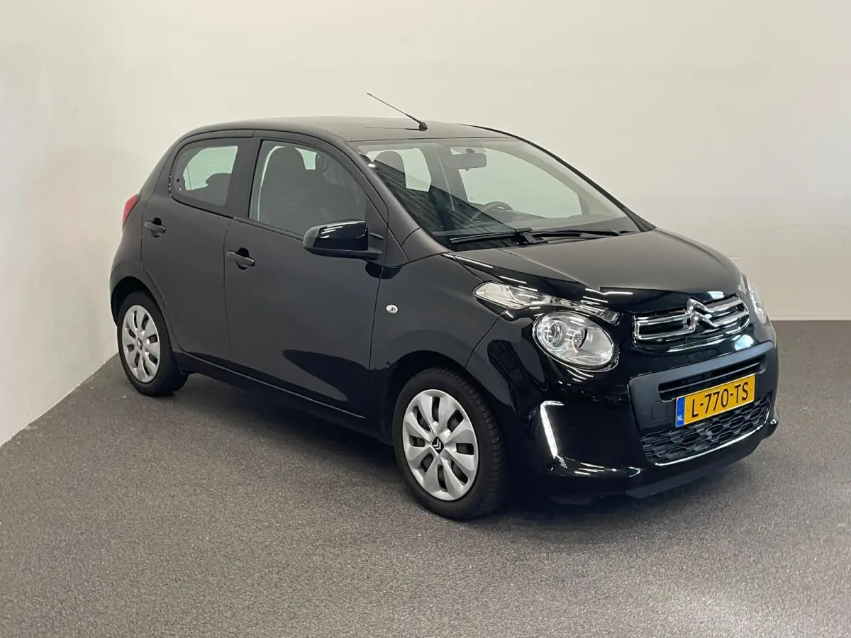 1.0 VTi Feel Airco Navigatie Apple Carplay Android Auto Achteruitrij camera Leder Multifunctioneel stuurwiel