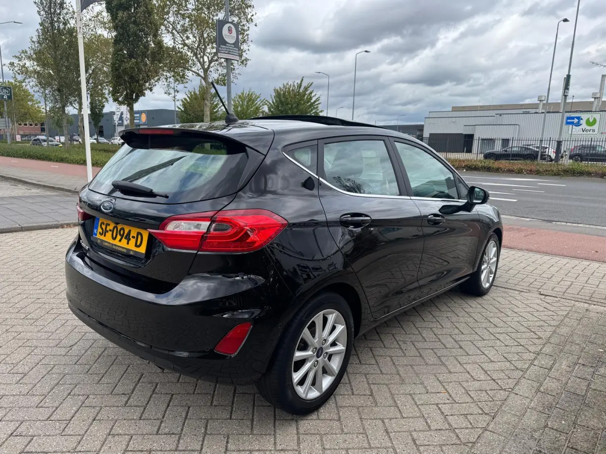 1.0 EcoBoost Titanium | Achteruitrijcamera | Adaptive Cruise Ctrl | Panoramadak | B&O Audiosysteem | Navigatie |