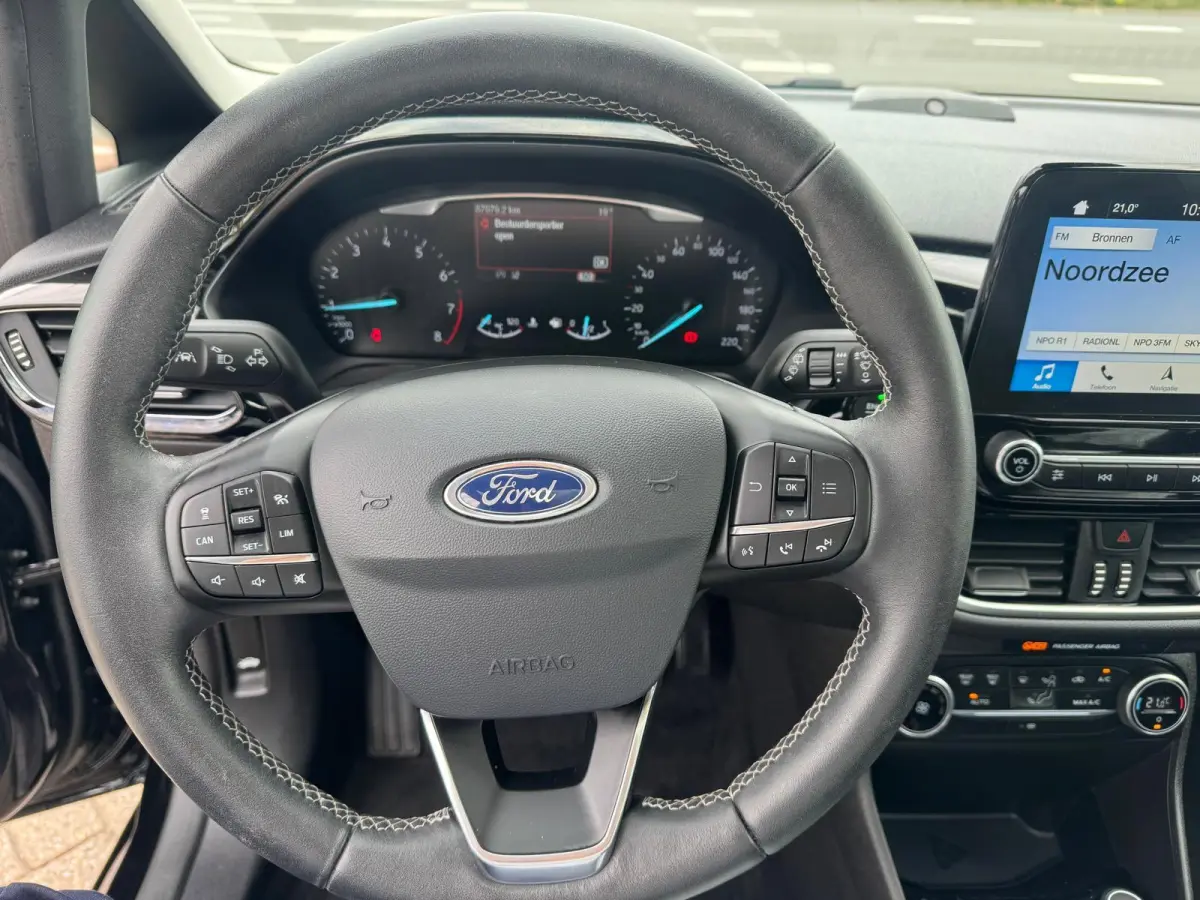 1.0 EcoBoost Titanium | Achteruitrijcamera | Adaptive Cruise Ctrl | Panoramadak | B&O Audiosysteem | Navigatie |