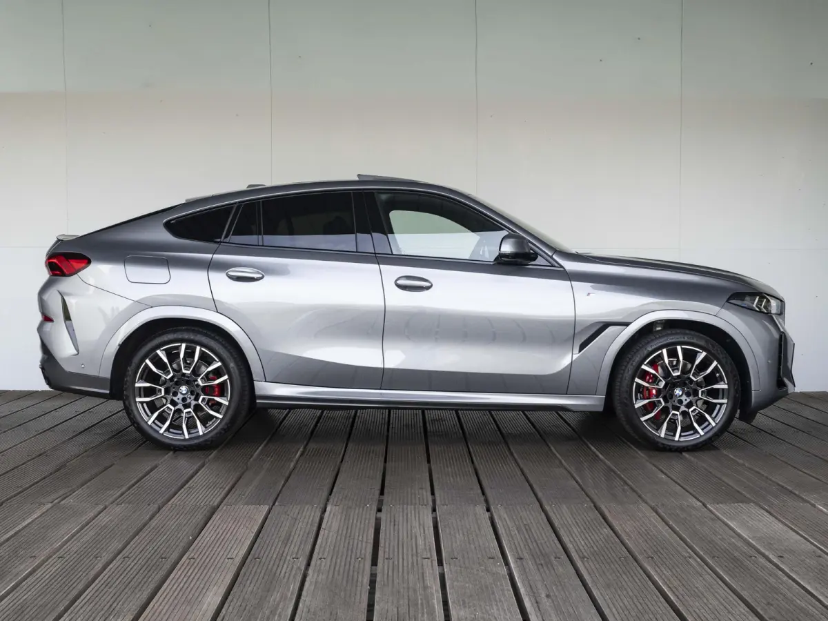 xDrive40i M Sportpakket Pro | M Sportuitlaat | Soft Close | Stoelventilatie | Driving Assistant Professional | Harman Kardon