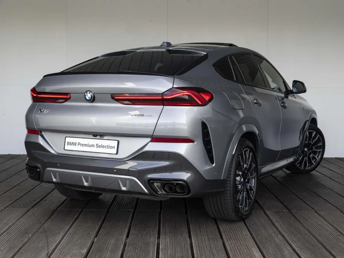 xDrive40i M Sportpakket Pro | M Sportuitlaat | Soft Close | Stoelventilatie | Driving Assistant Professional | Harman Kardon