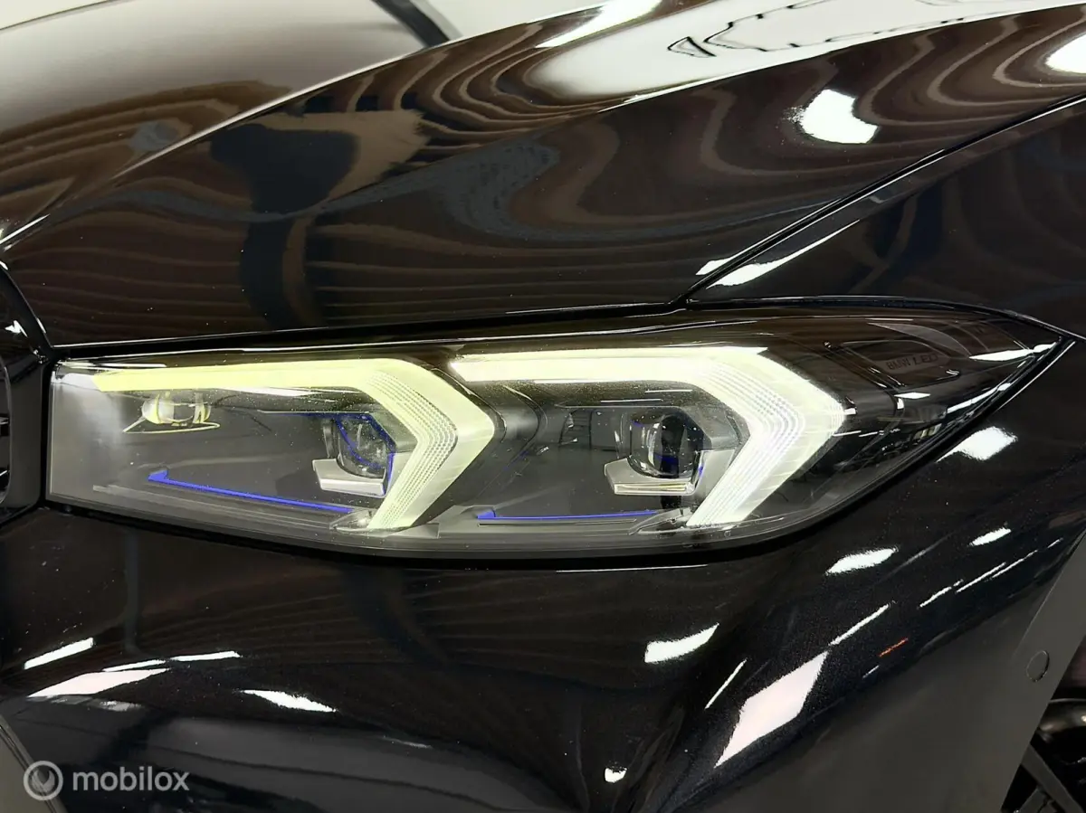330e M Sport | Pano | Laser | M Onderstel | 19" | Leer | Trekhaak | Shadow | Dodeh. | Stoelverw. | Sfeer | Cam | SOH 99% | 292 PK