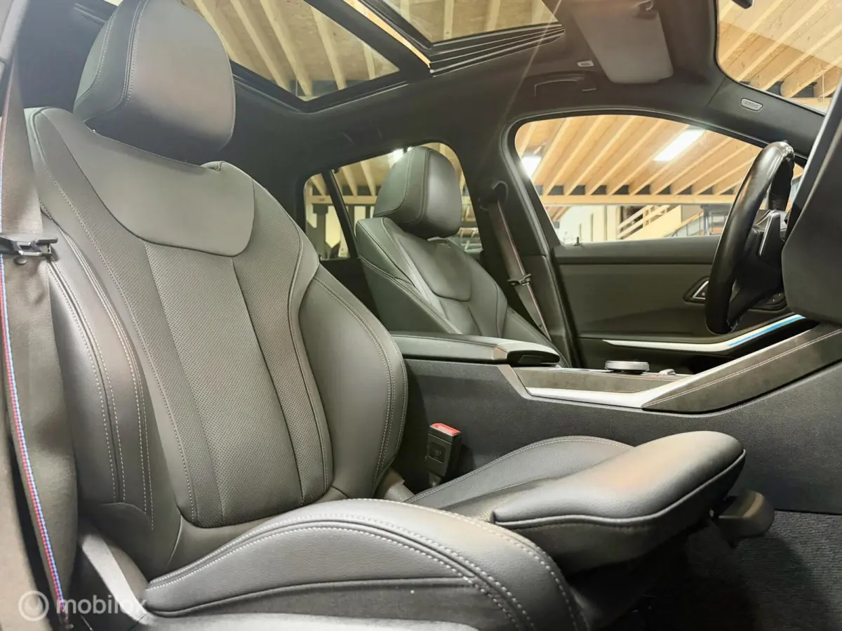 330e M Sport | Pano | Laser | M Onderstel | 19" | Leer | Trekhaak | Shadow | Dodeh. | Stoelverw. | Sfeer | Cam | SOH 99% | 292 PK