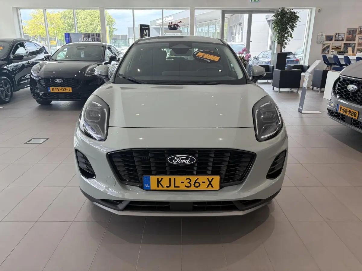 1.0 EcoBoost Titanium | € 5.000,- KORTING! | CRUISE CONTROL | ACHTERUITRIJCAMERA | PARKEERSENSOREN ACHTER | DRAADLOOS APPLE CARPLAY EN ANDROID AUTO | FULL LED KOPLAMPEN | NAVIGATIESYSTEEM 