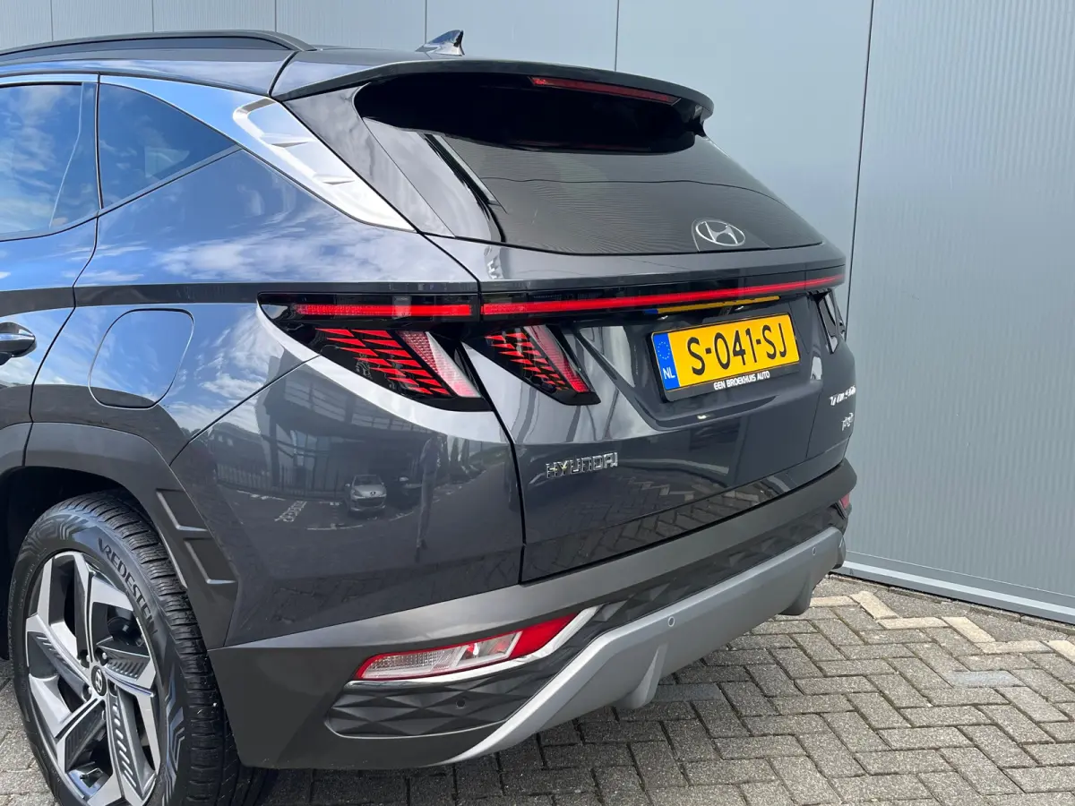 1.6 T-GDI 265pk PHEV Comfort Smart 4WD | Climate | Camera | Carplay | Keyless | Navigatie | Full - Led | Elek. Klep | Winterpakket | 19" Lichtmetaal | Digitale Cockpit | Parkeer Assistent | 