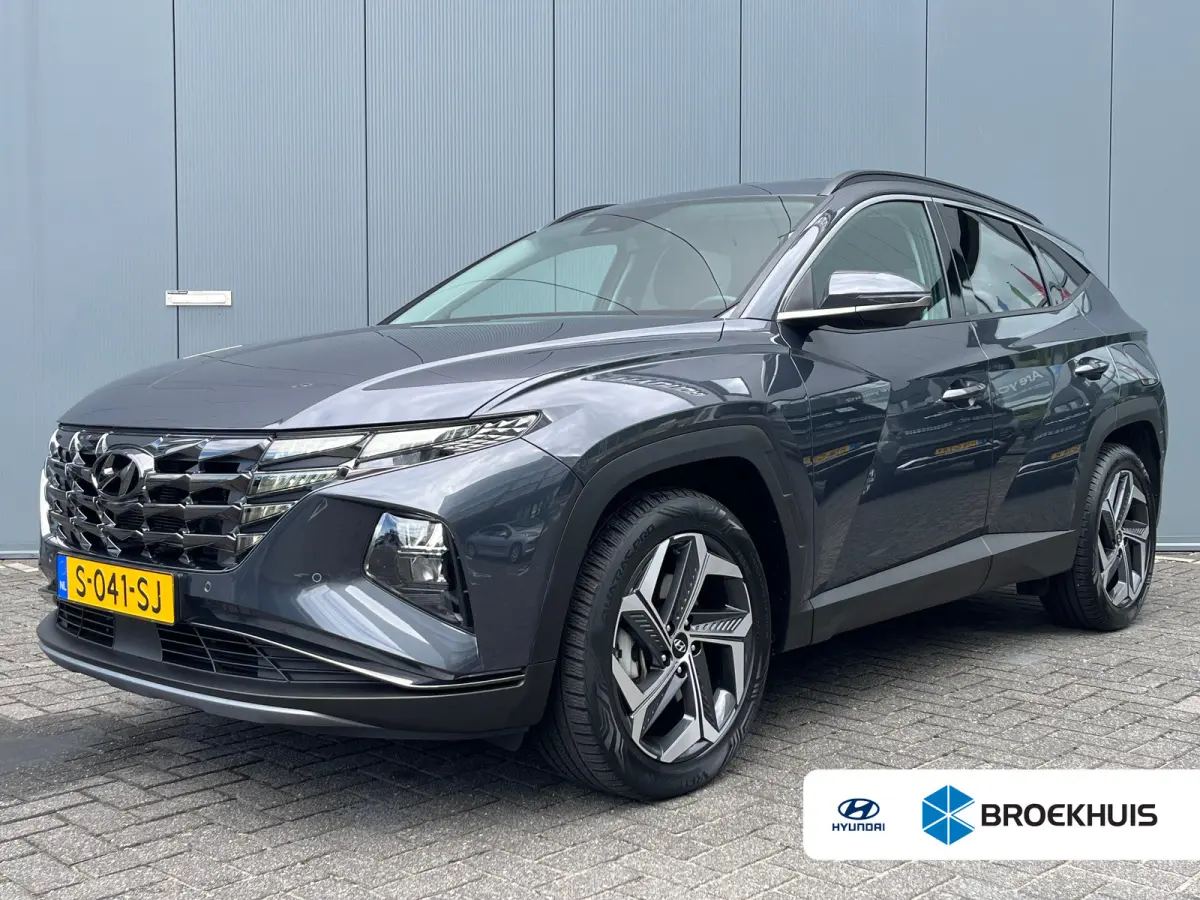 1.6 T-GDI 265pk PHEV Comfort Smart 4WD | Climate | Camera | Carplay | Keyless | Navigatie | Full - Led | Elek. Klep | Winterpakket | 19" Lichtmetaal | Digitale Cockpit | Parkeer Assistent | 