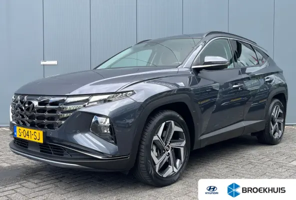 1.6 T-GDI 265pk PHEV Comfort Smart 4WD | Climate | Camera | Carplay | Keyless | Navigatie | Full - Led | Elek. Klep | Winterpakket | 19" Lichtmetaal | Digitale Cockpit | Parkeer Assistent | 