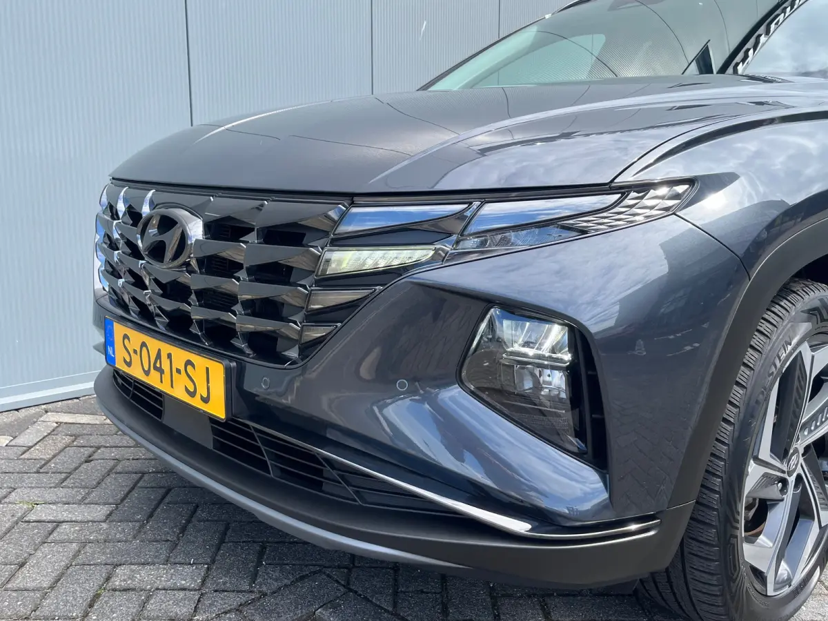 1.6 T-GDI 265pk PHEV Comfort Smart 4WD | Climate | Camera | Carplay | Keyless | Navigatie | Full - Led | Elek. Klep | Winterpakket | 19" Lichtmetaal | Digitale Cockpit | Parkeer Assistent | 