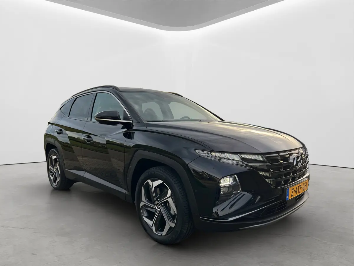 1.6 T-GDI 265pk PHEV Premium 4WD | Leder | Carplay | Climate | Keyless | Navigatie | Elek. Klep | Full - Led | 360 Camera | KRELL Audio | Elek. Stoelen | 19" Lichtmetaal | Winterpakket | Sto