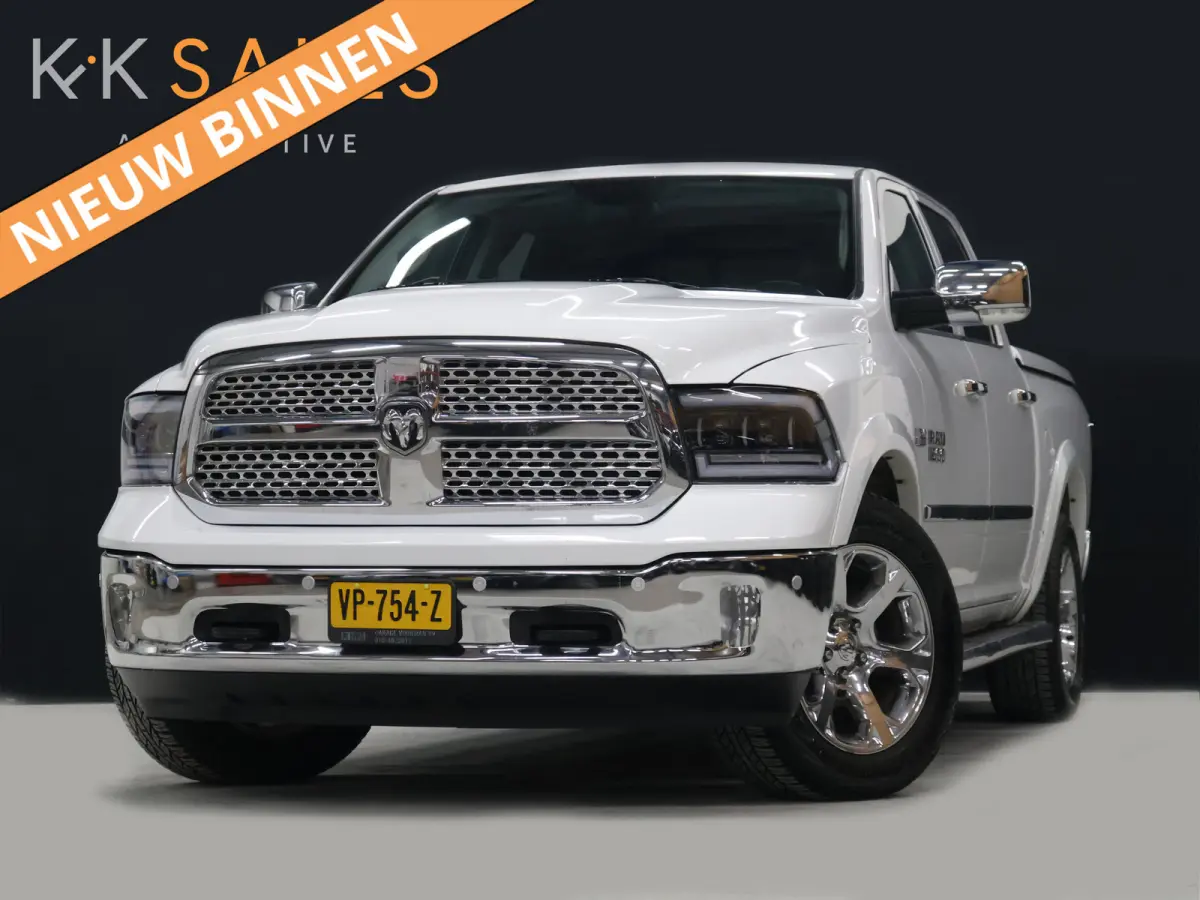 1500 5.7 V8 Quad Cab 6'4 [SCHUIFKANTELDAK, ALPINE SOUND SYSTEM, CAMERA PDC V+A, CRUISE CONTROL, STOEL VENTILATIE, STOELVERWARMING, STUUR VERWARMING, MEMORY SEATS, NAVIGATIE, CLIMATE CONTROL,
