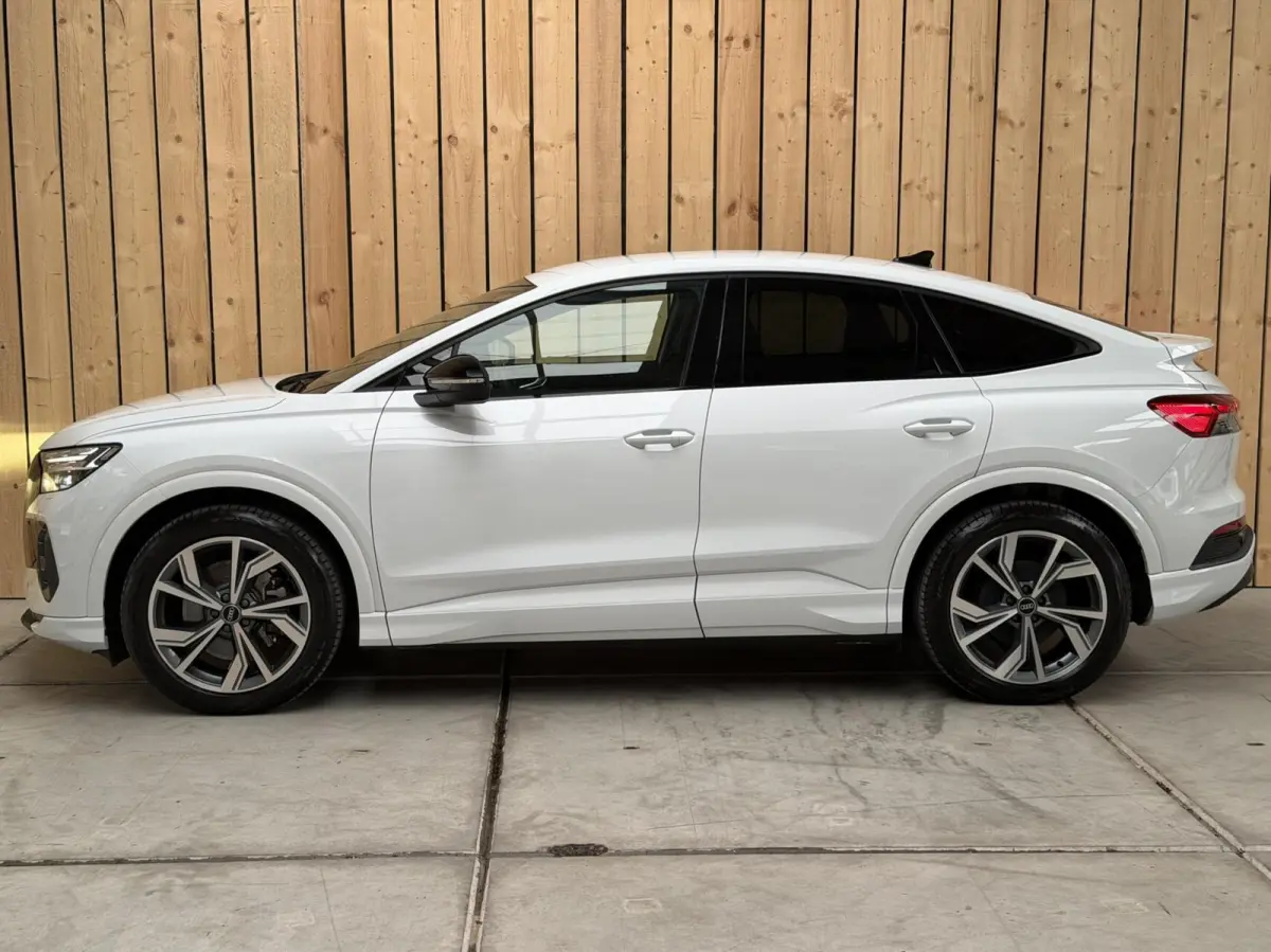 40 Advanced edition 77 kWh SoH 96,69% | Achteruitrijcamera | Apple CarPlay/Android Auto | Adaptieve cruise control | Climate control | Extra getint glas | LED verlichting | Parkeersensoren v