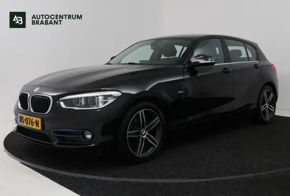 118i High Executive (CAMERA, STOELVERWARMING, NAVIGATIE, CRUISE CONTROL)
