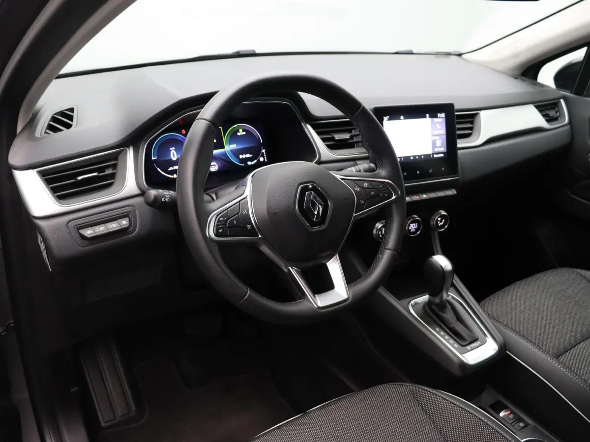E-Tech Plug-in Hybrid 160pk Intens | Trekhaak | Dealer onderhouden | Camera | Climate control | 18" Lichtmetaal |