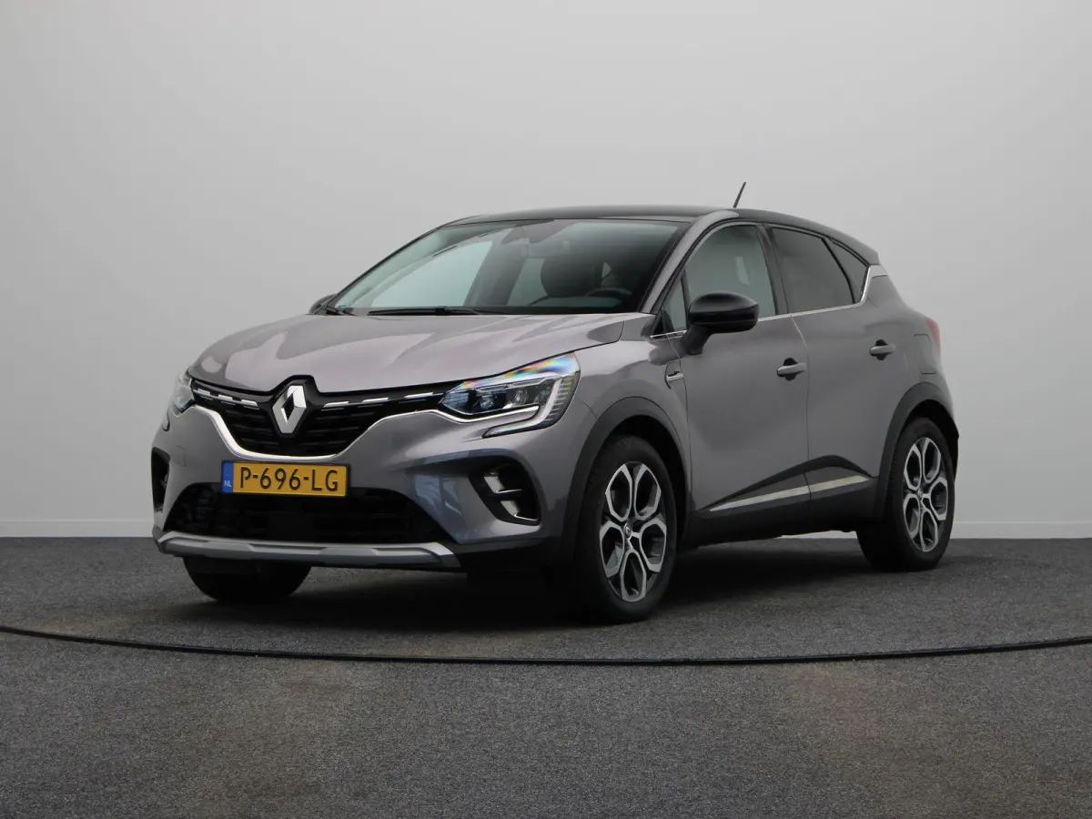 E-Tech Plug-in Hybrid 160pk Intens | Trekhaak | Dealer onderhouden | Camera | Climate control | 18" Lichtmetaal |