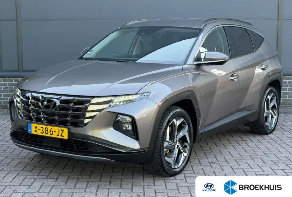 1.6 T-GDI PHEV Comfort Smart 4WD / Dealer Onderhouden / Trekhaak / SOH 100% / 1350KG Trekgewicht / Fabrieksgarantie tot 01-2029 / Stuur & Stoelverwarming / Elektrische Achterklep / Navigatie