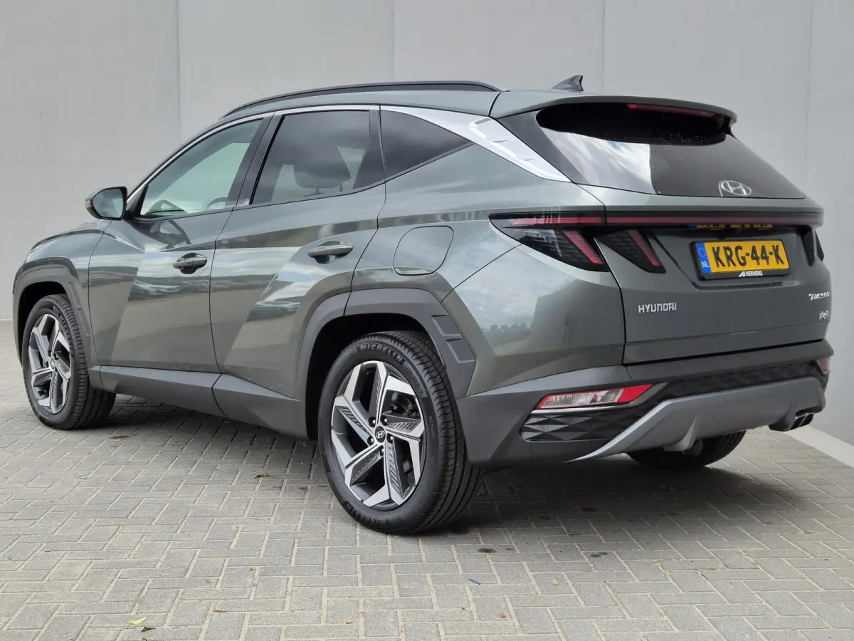 1.6 T-GDI PHEV Comfort Smart 4WD / SOH 100% / Dealer onderhouden / Fabrieksgarantie tot 06-2027 / Trekhaak afneembaar / Trekgewicht 1350 kg / Stuur- & Stoelverwarming / Achteruitrijcamera / 