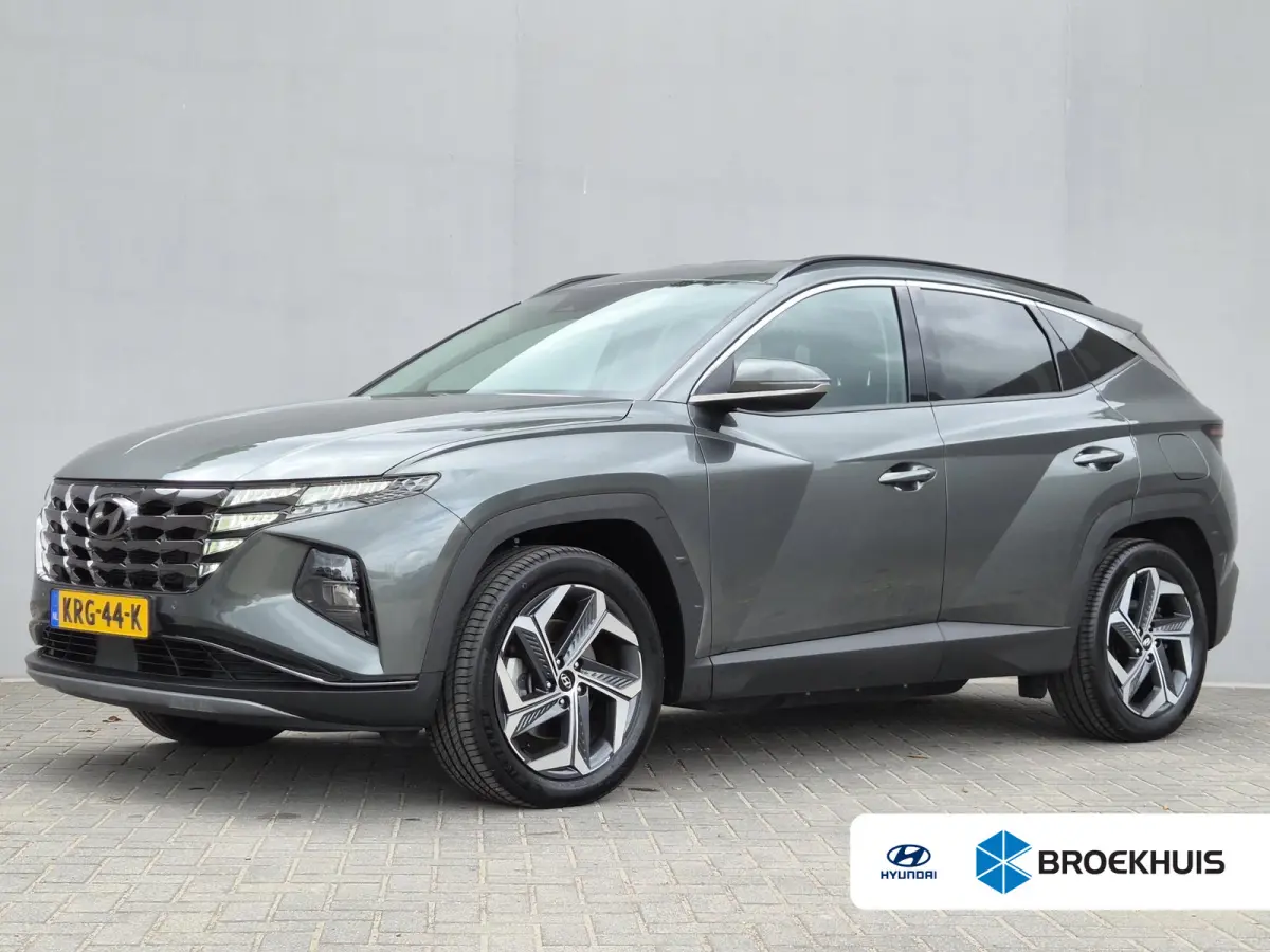 1.6 T-GDI PHEV Comfort Smart 4WD / SOH 100% / Dealer onderhouden / Fabrieksgarantie tot 06-2027 / Trekhaak afneembaar / Trekgewicht 1350 kg / Stuur- & Stoelverwarming / Achteruitrijcamera / 