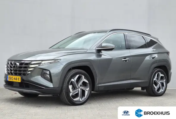 1.6 T-GDI PHEV Comfort Smart 4WD / SOH 100% / Dealer onderhouden / Fabrieksgarantie tot 06-2027 / Trekhaak afneembaar / Trekgewicht 1350 kg / Stuur- & Stoelverwarming / Achteruitrijcamera / 