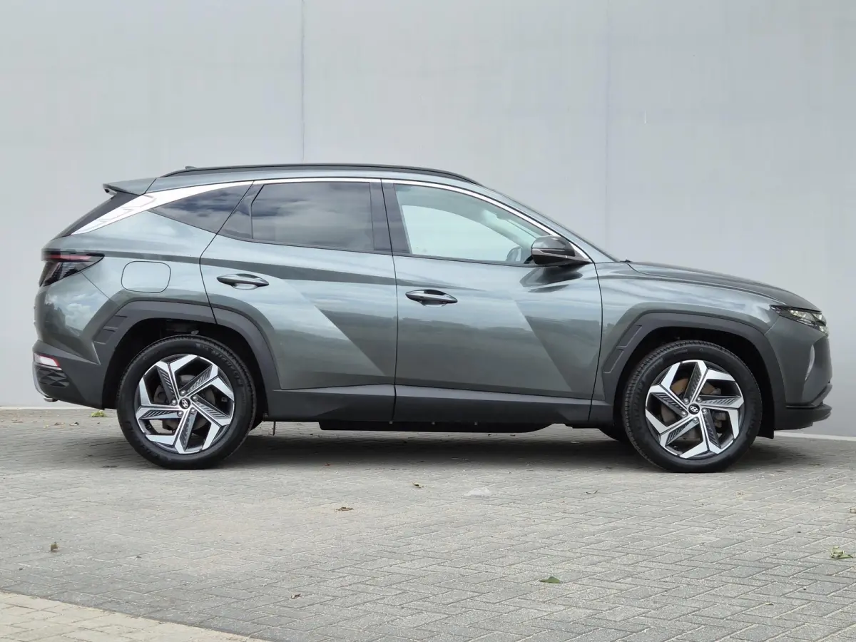 1.6 T-GDI PHEV Comfort Smart 4WD / SOH 100% / Dealer onderhouden / Fabrieksgarantie tot 06-2027 / Trekhaak afneembaar / Trekgewicht 1350 kg / Stuur- & Stoelverwarming / Achteruitrijcamera / 