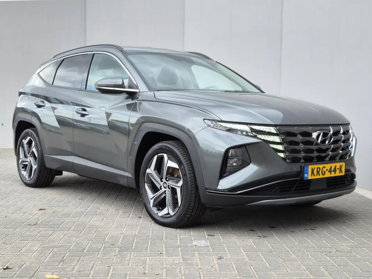 1.6 T-GDI PHEV Comfort Smart 4WD / SOH 100% / Dealer onderhouden / Fabrieksgarantie tot 06-2027 / Trekhaak afneembaar / Trekgewicht 1350 kg / Stuur- & Stoelverwarming / Achteruitrijcamera / 