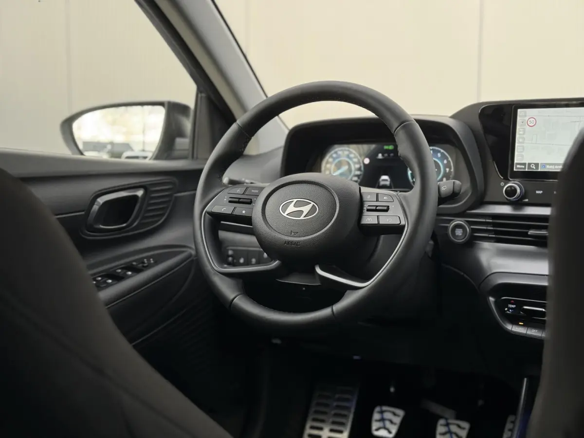 1.0 T-GDI Premium / Dodehoekdetectie / Stoel- & Stuurverwarming / Achteruitrijcamera / Climate Control / Cruise Control