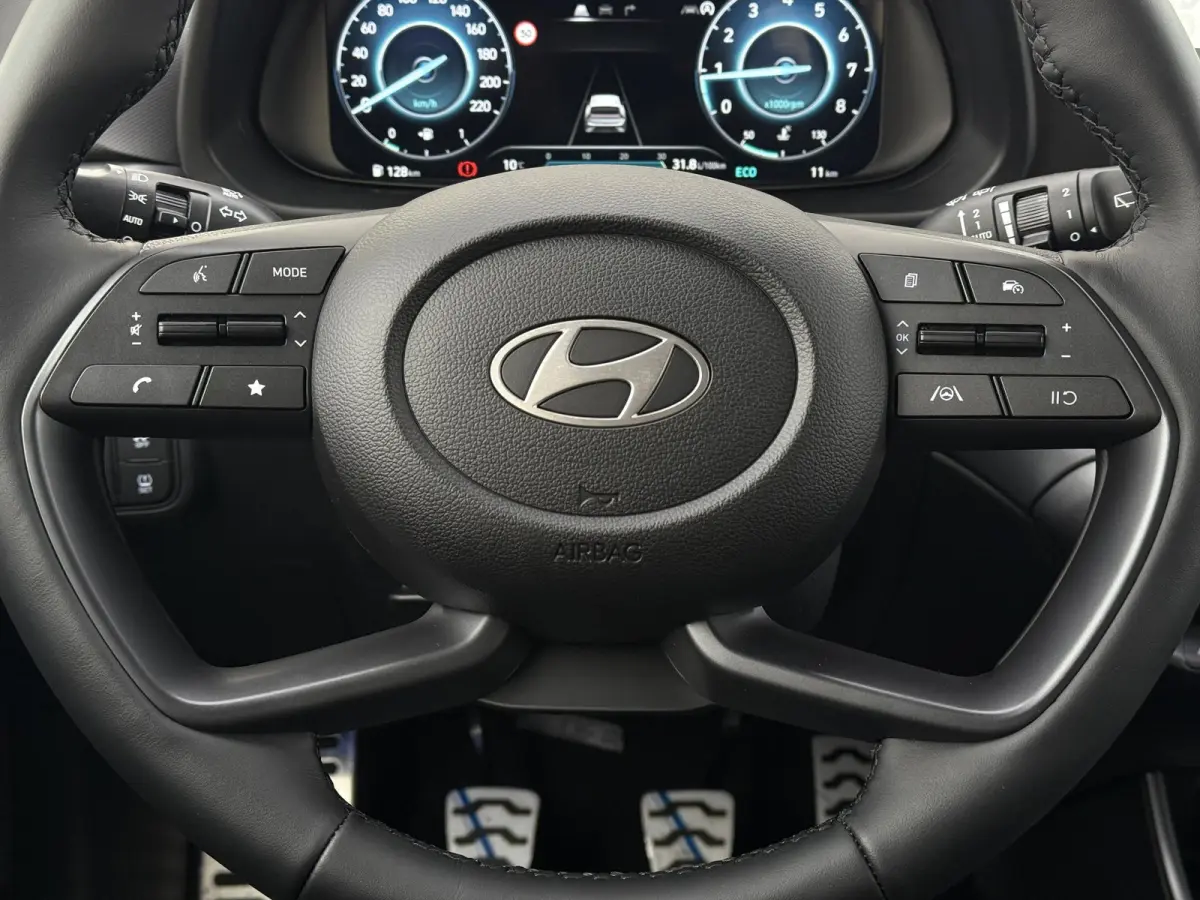 1.0 T-GDI Premium / Dodehoekdetectie / Stoel- & Stuurverwarming / Achteruitrijcamera / Climate Control / Cruise Control