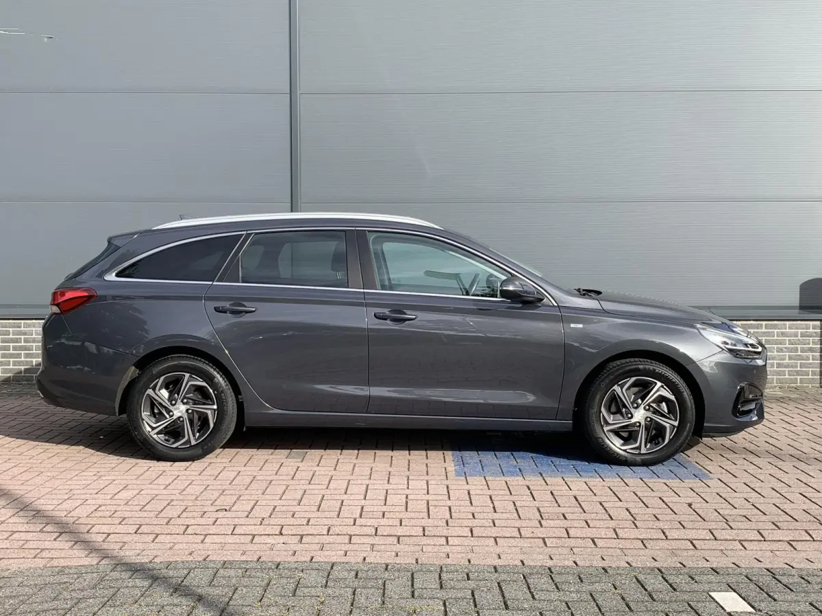 1.5 T-GDi MHEV Premium / Dealer onderhouden / Trekhaak / 1410 kg Trekgewicht / Navigatie / Stoel & Stuurverwarming / Apple Carplay & Android Auto /