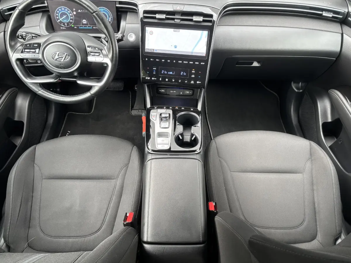 1.6 T-GDI HEV Comfort Smart / Afneembare Trekhaak / 1650 kg Trekgewicht / Stoel en Stuurverwarming / Navigatiesysteem / Apple Carplay / Android Auto / Adaptieve Cruise Control / Achteruitrij