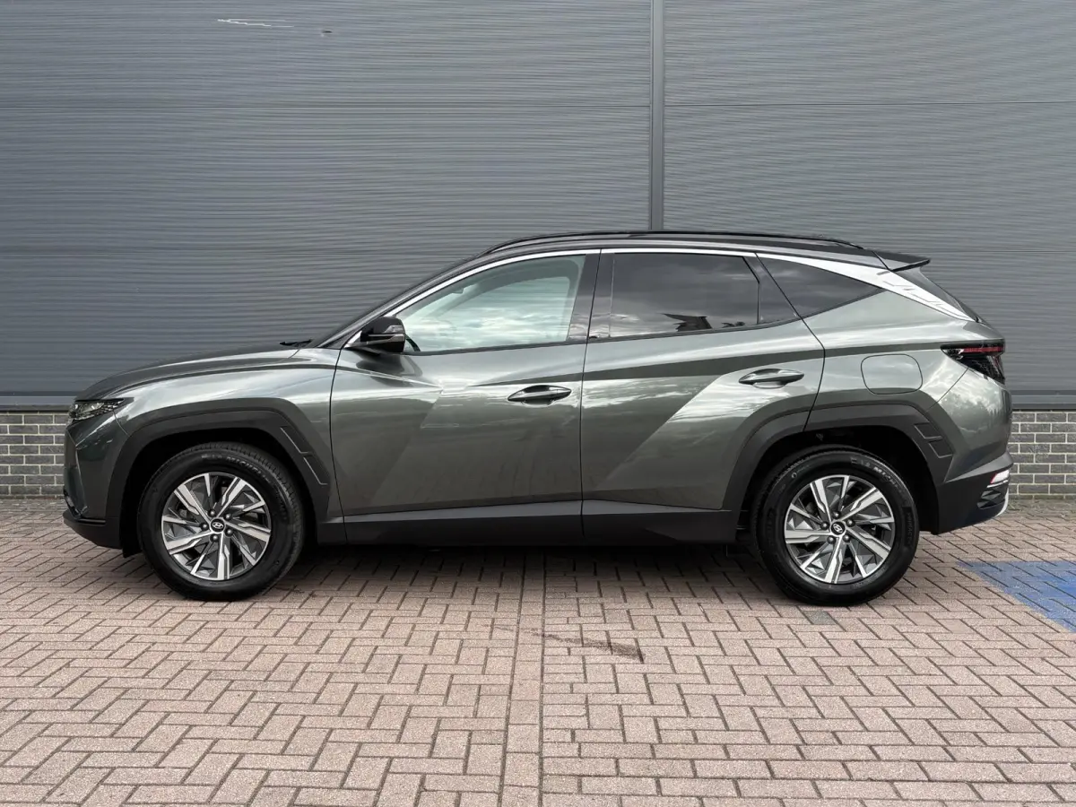 1.6 T-GDI HEV Comfort Smart / Afneembare Trekhaak / 1650 kg Trekgewicht / Stoel en Stuurverwarming / Navigatiesysteem / Apple Carplay / Android Auto / Adaptieve Cruise Control / Achteruitrij