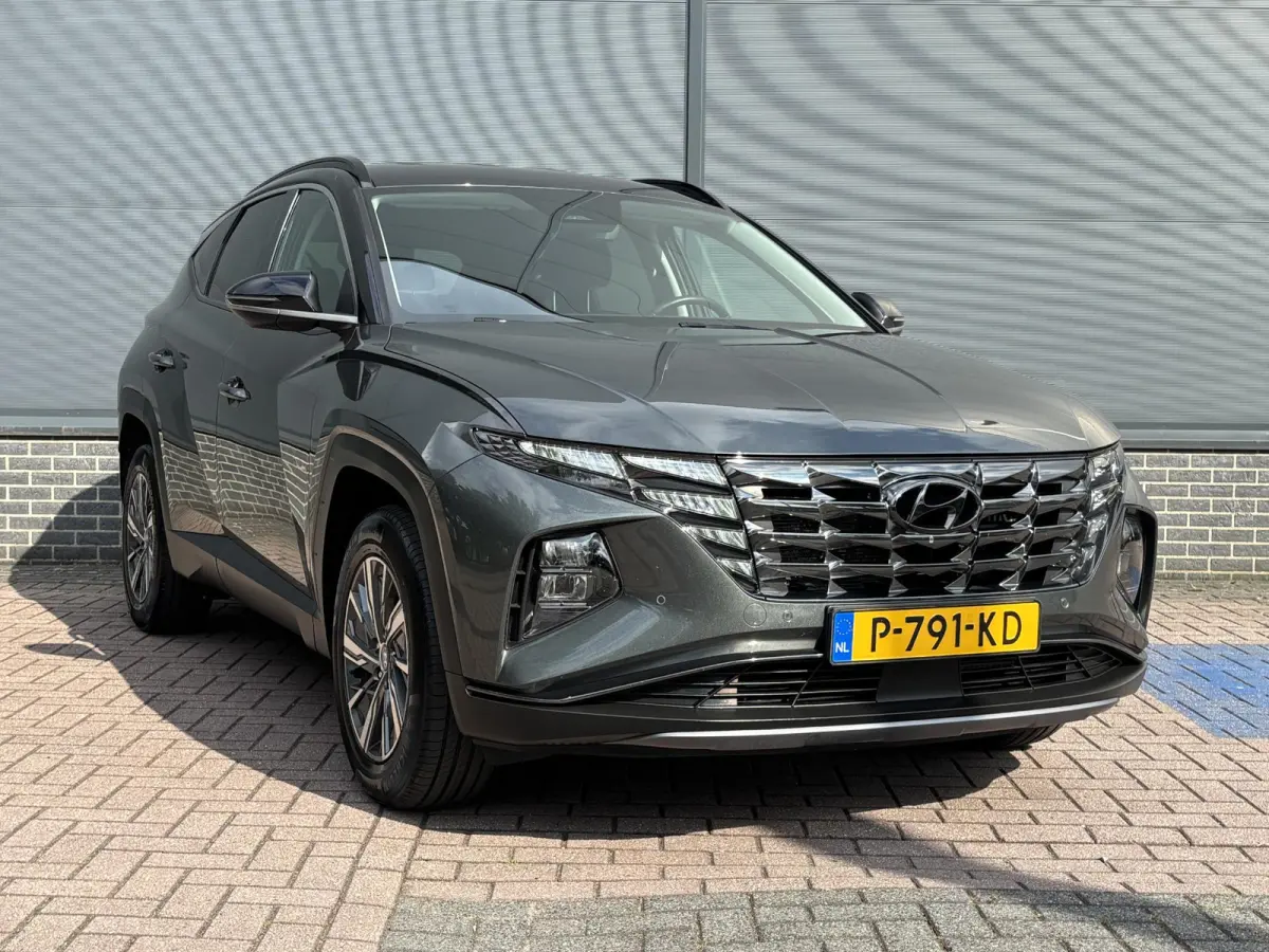 1.6 T-GDI HEV Comfort Smart / Afneembare Trekhaak / 1650 kg Trekgewicht / Stoel en Stuurverwarming / Navigatiesysteem / Apple Carplay / Android Auto / Adaptieve Cruise Control / Achteruitrij