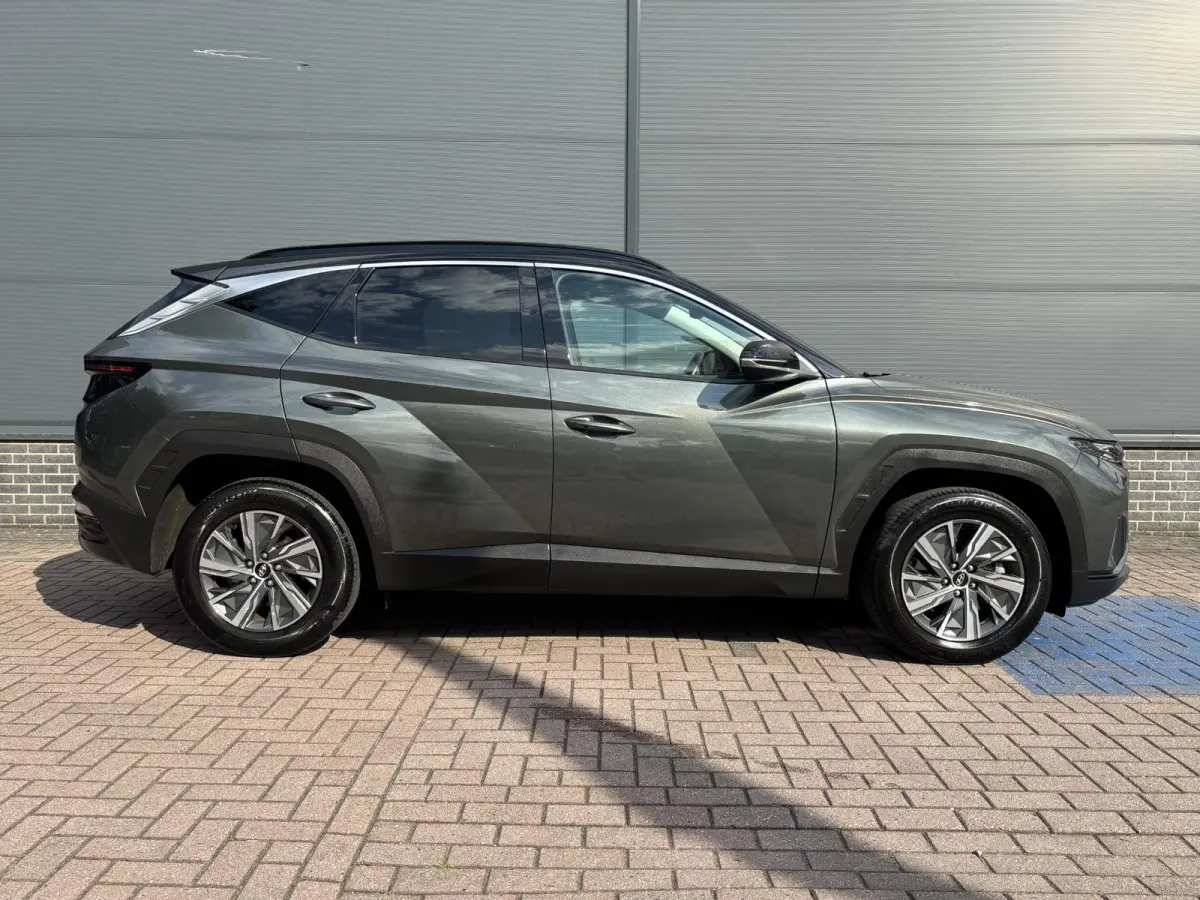1.6 T-GDI HEV Comfort Smart / Afneembare Trekhaak / 1650 kg Trekgewicht / Stoel en Stuurverwarming / Navigatiesysteem / Apple Carplay / Android Auto / Adaptieve Cruise Control / Achteruitrij