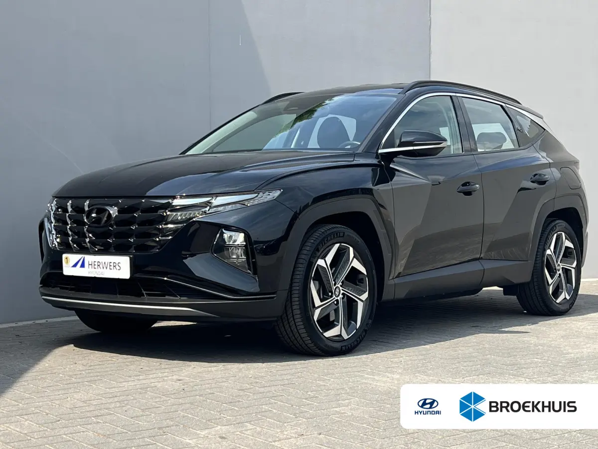 1.6 T-GDI PHEV Comfort 4WD / Fabrieksgarantie tot 07-2027 / Accu SoH 100 % / 1.350 kg trekgewicht / Navigatie / Stuur- & Stoelverwarming / Apple Carplay Android / 19" LM wielen /
