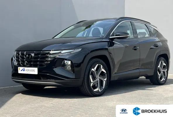 1.6 T-GDI PHEV Comfort 4WD / Fabrieksgarantie tot 07-2027 / Accu SoH 100 % / 1.350 kg trekgewicht / Navigatie / Stuur- & Stoelverwarming / Apple Carplay Android / 19" LM wielen /