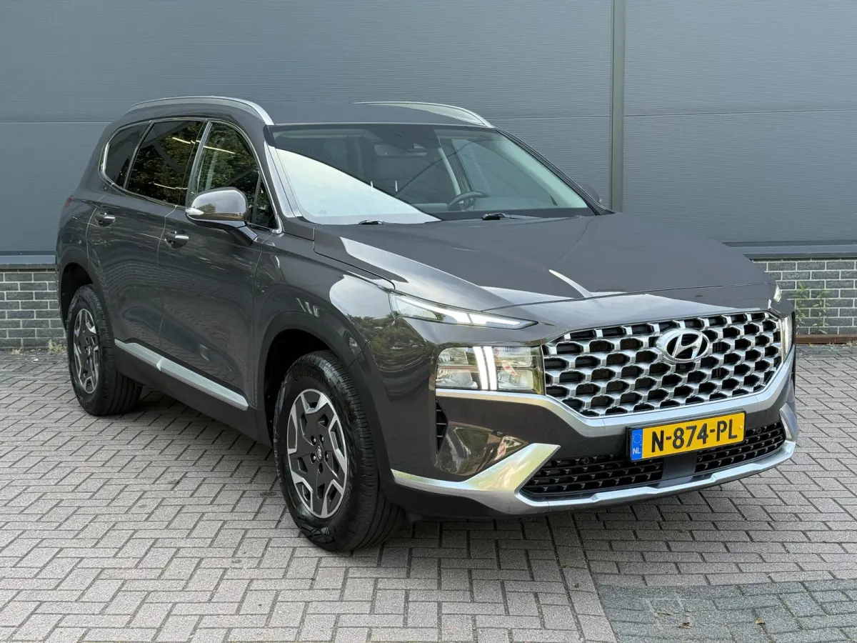 1.6 T-GDI HEV Comfort Smart / Dealer Onderhouden / Trekhaak / 1650 KG Trekgewicht / Stoel Verwarming / Elektrische Stoelen / Achteruitrij Camera / Apple Carplay & Android Auto /