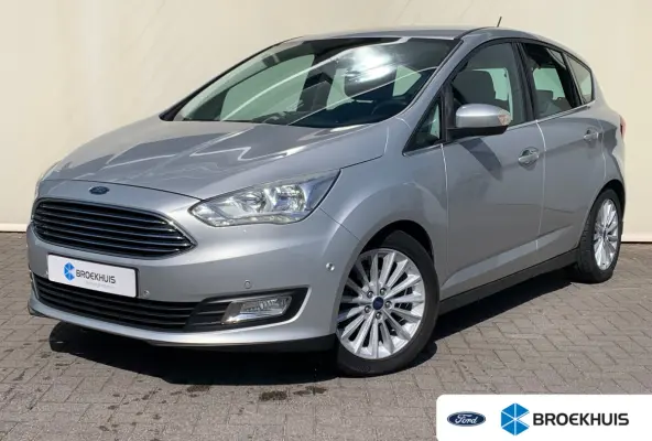 1.0 Titanium Airco | Cruise Control | DAB | Keyless | LMV 17" | Navi | Parkeerassist | PDC V&A | Voorruitverwarming |