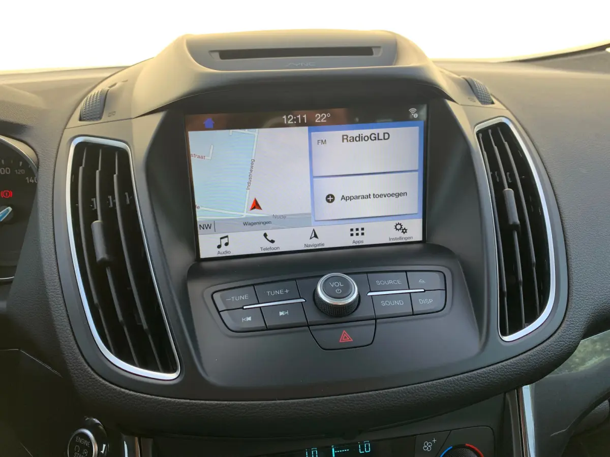 1.0 Titanium Airco | Cruise Control | DAB | Keyless | LMV 17" | Navi | Parkeerassist | PDC V&A | Voorruitverwarming |