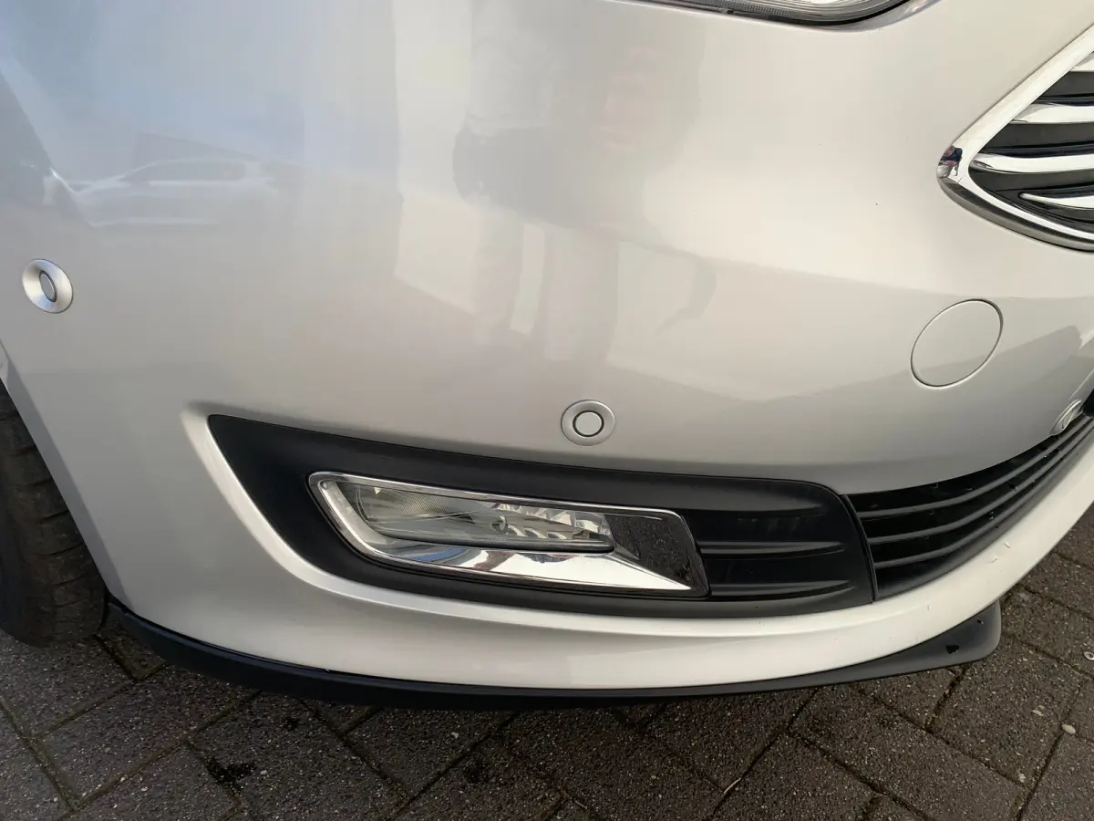 1.0 Titanium Airco | Cruise Control | DAB | Keyless | LMV 17" | Navi | Parkeerassist | PDC V&A | Voorruitverwarming |