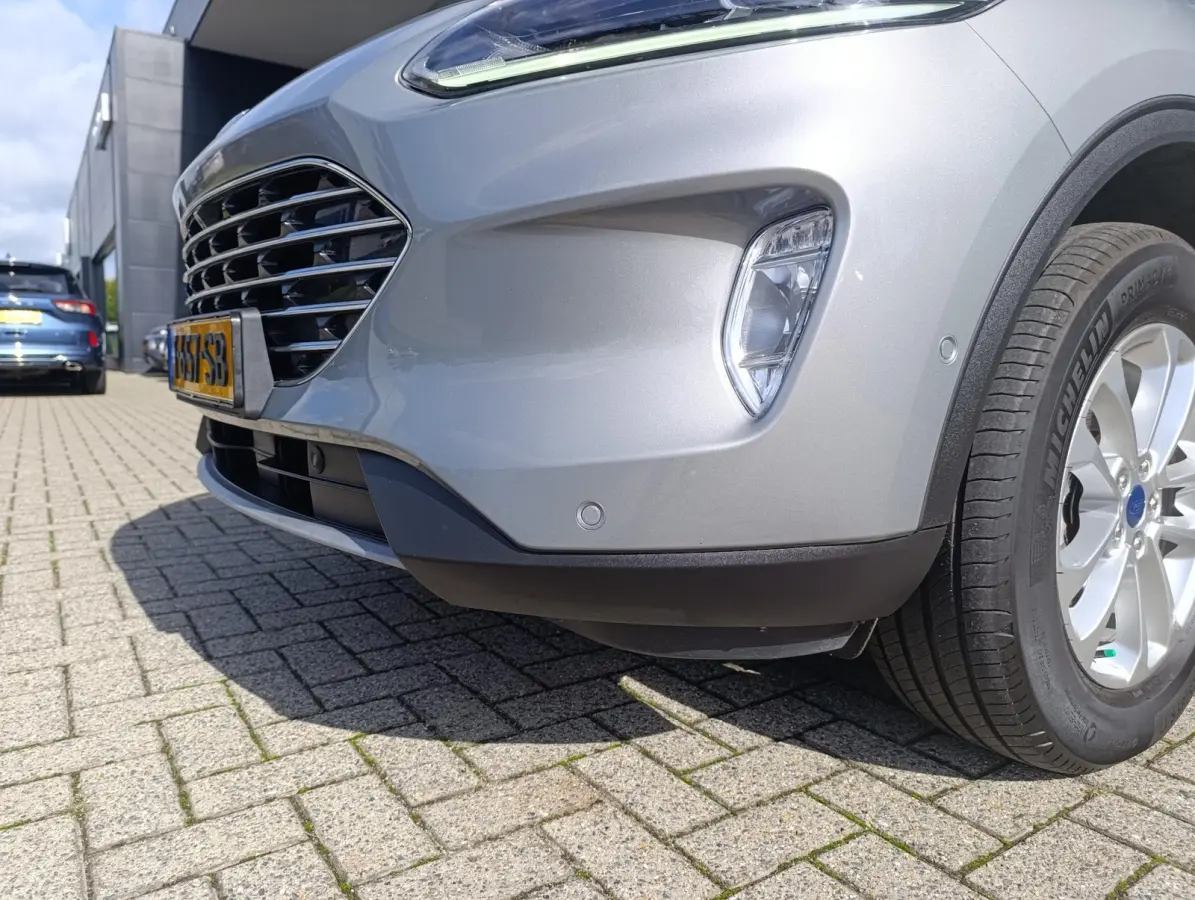 2.5 PHEV Titanium | Adaptieve Cruise | Stoel/stuur- voorruitverwarming | Trekhaak | Dodehoekdetectie | Camera V+A | Dealeronderhouden