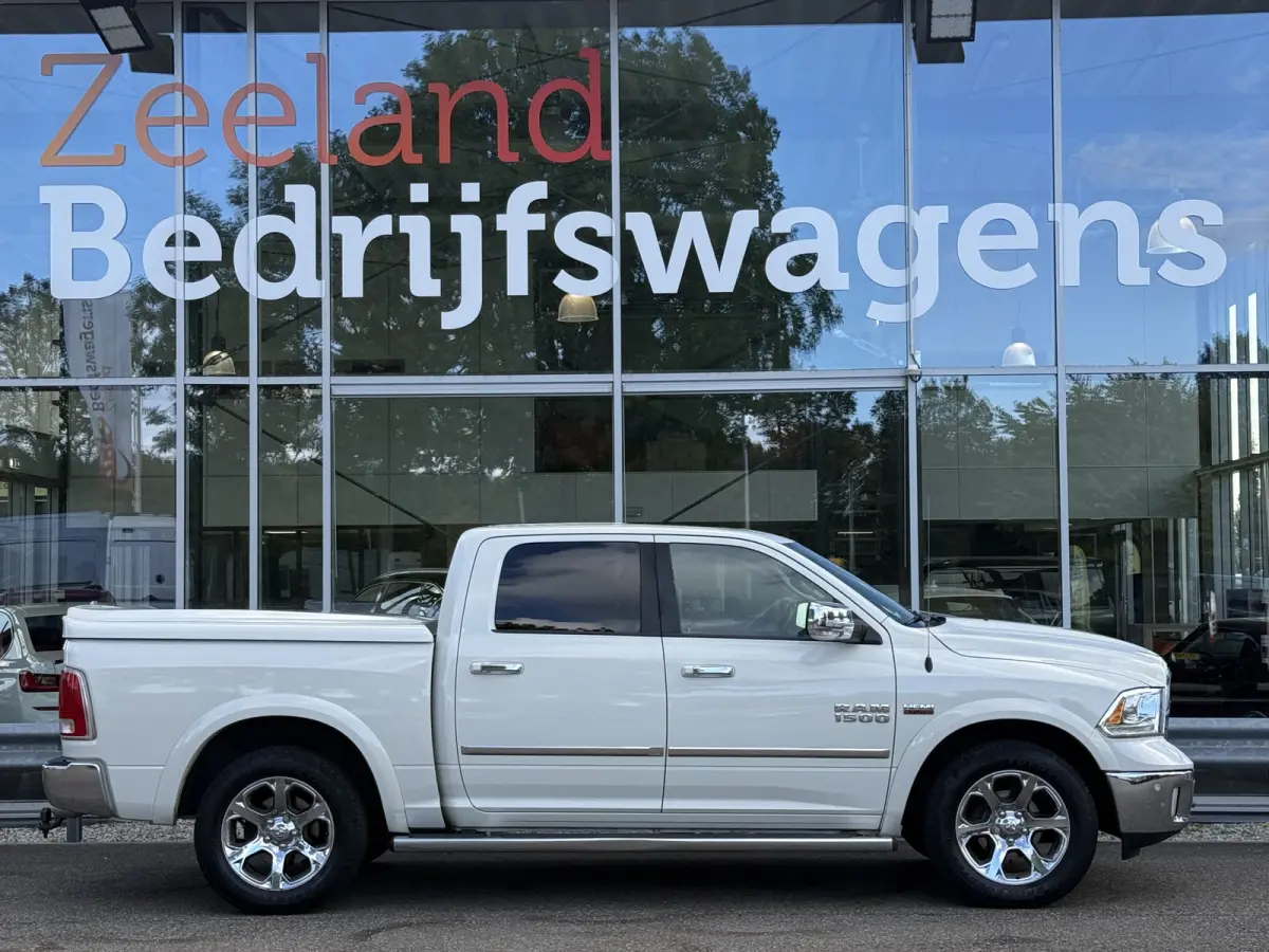 1500 5.7 V8 4x4 Quad Cab 6'4 Laramie | Lage Bijtelling | Dakraam | LPG 200L | Stoelverw/Stoelverk