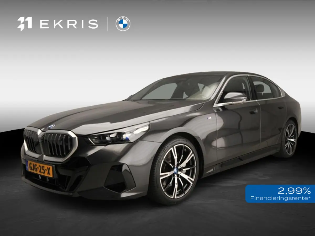 eDrive40 | M-Sportpakket | LED | HUD | Active cruise | Trekhaak | Panoramadak | Comfortzetels | DAB | Harman-kardon sound | Alu 20 inch