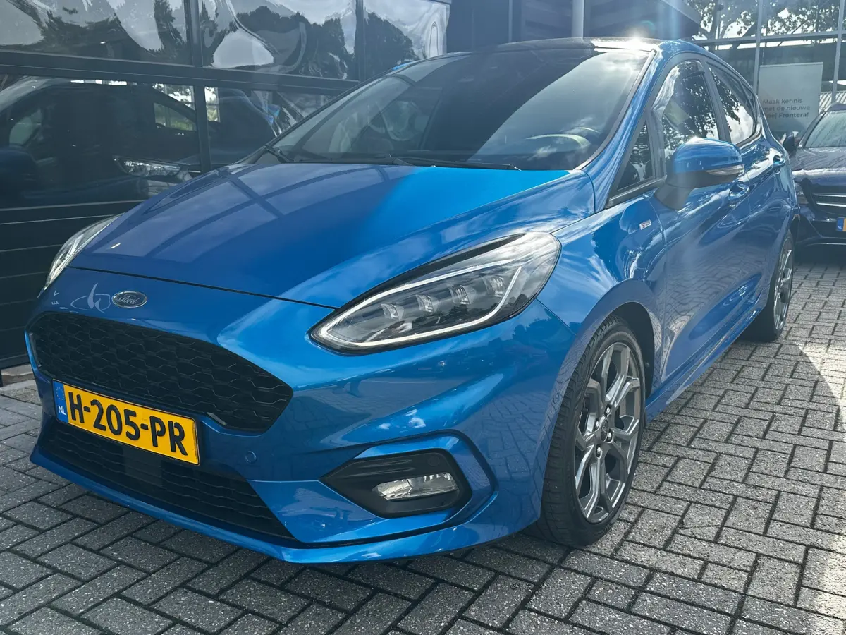 1.0 95 PK ST-Line X | ELEK. GLAZEN SCHUIF-/KANTELDAK| ADAPTIEVE CRUISE CONTROL| B&O SOUND| FULL LED| DODEHOEK DETECTIE| KEYLESS ENTRY & START| STUUR, STOEL EN VOORRUITVERWARMING| NAVIGATIE +